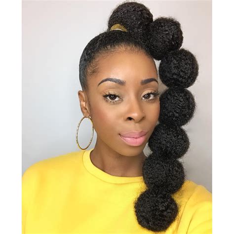 afro puff ponytail with braids